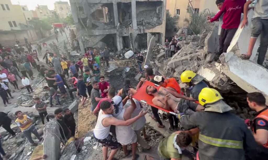 Gaza medics pull survivors from under rubble in Gaza's Khan Younis