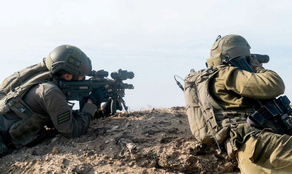 Israeli soldiers operate in the Gaza Strip amid the ongoing conflict between Israel and the Palestinian Islamist group Hamas, in this handout image released December 7, 2023. Israel Defense Forces/Handout via REUTERS    THIS IMAGE HAS BEEN SUPPLIED BY A THIRD PARTY