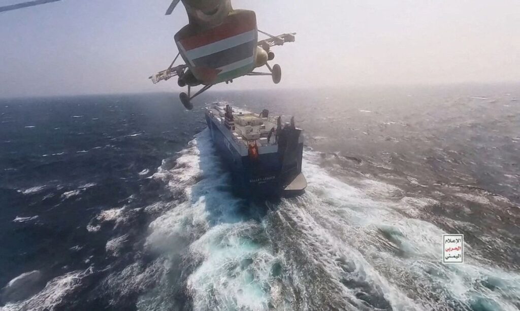 FILE PHOTO: Houthi military helicopter flies over the Galaxy Leader cargo ship in the Red Sea in this photo released November 20, 2023. Houthi Military Media/Handout via REUTERS    THIS IMAGE HAS BEEN SUPPLIED BY A THIRD PARTY/File Photo