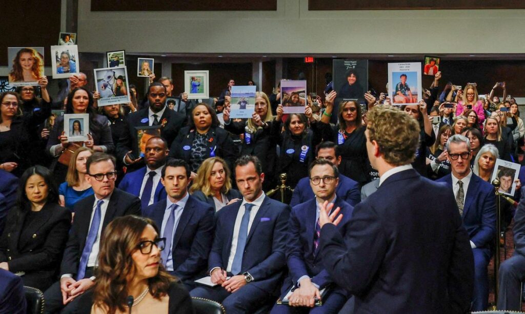 Meta's CEO Mark Zuckerberg stands and faces the audience as he testifies during the Senate Judiciary Committee hearing on online child sexual exploitation at the U.S. Capitol in Washington, U.S., January 31, 2024. REUTERS/Evelyn Hockstein     TPX IMAGES OF THE DAY