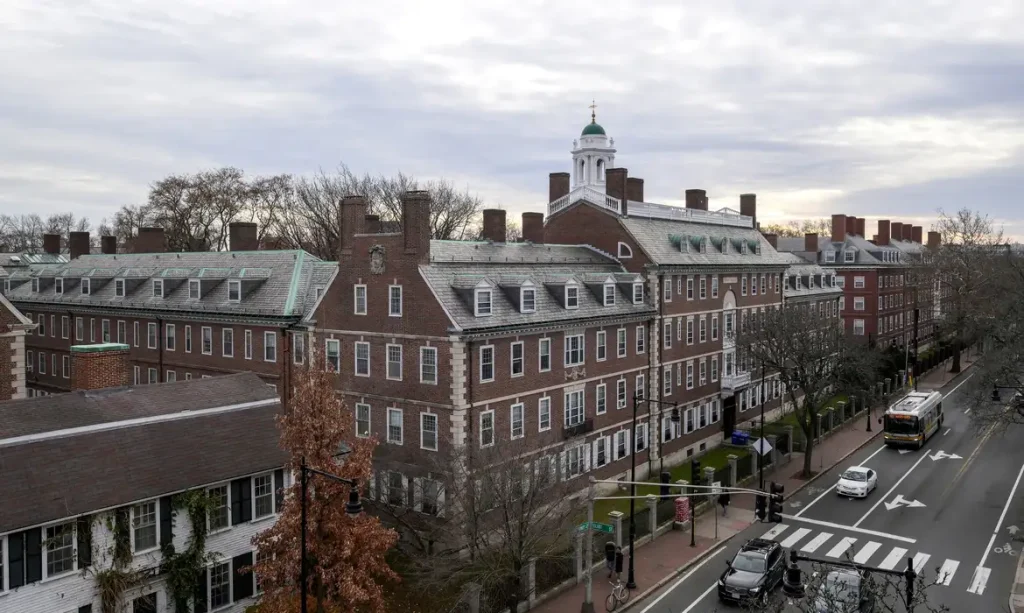 FILE PHOTO: A view of Harvard campus on John F. Kennedy Street at Harvard University is pictured in Cambridge, Massachusetts, U.S., December 7, 2023.  REUTERS/Faith Ninivaggi/File Photo/File Photo