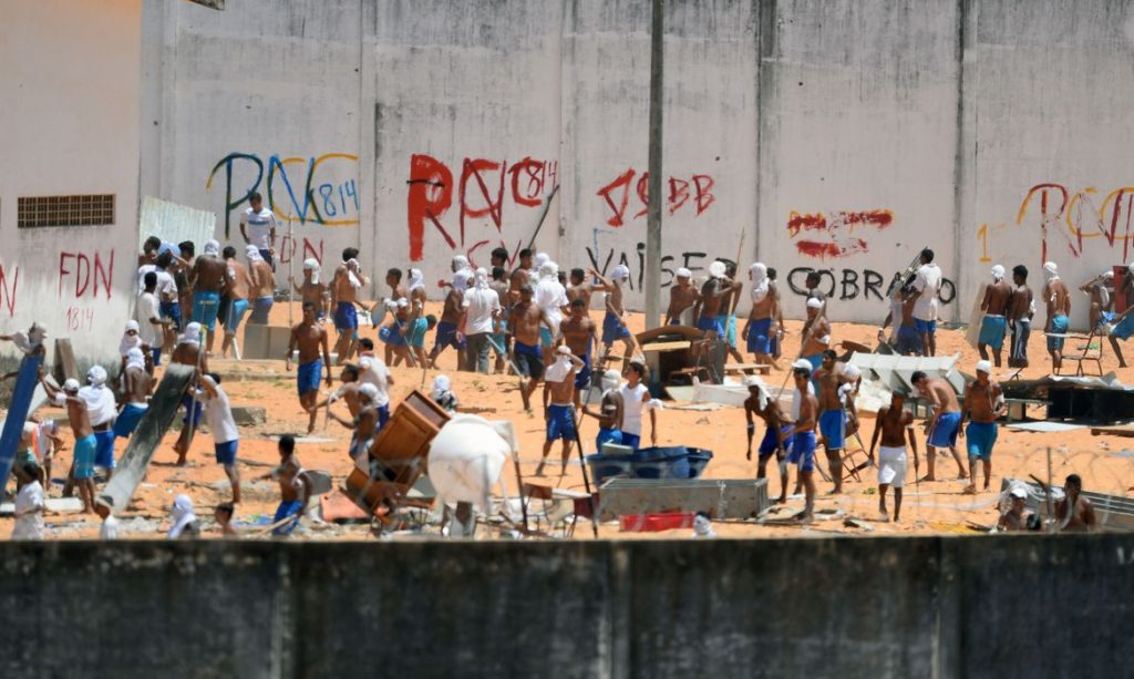 Natal - Policiais do Batalhão de Choque invadem a Penitenciária Estadual de Alcaçuz, no Rio Grande do Norte (Andressa Anholete/AFP/Direitos Reservados )