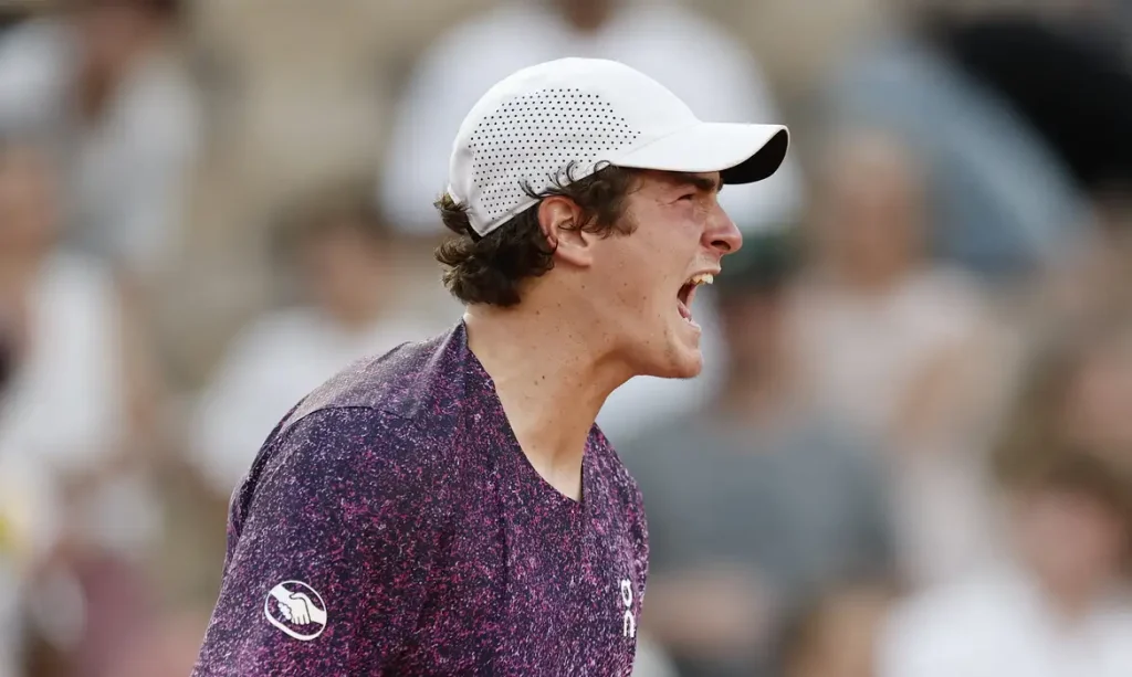 Tennis - French Open - Roland Garros, Paris, France - May 24, 2026 Brazil's Joao Fonseca celebrates winning his first round match against France's Luka Pavlovic REUTERS/Benoit Tessier
