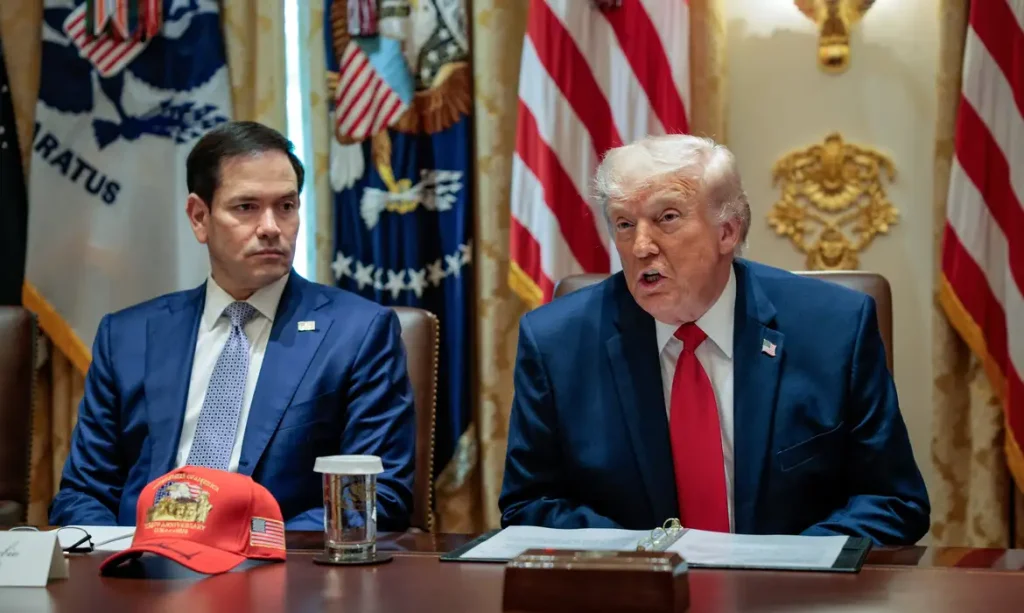 U.S. President Donald Trump speaks next to Secretary of State Marco Rubio during a cabinet meeting in the Cabinet Room at the White House, in Washington, D.C., U.S., May 27, 2026. REUTERS/Evan Vucci