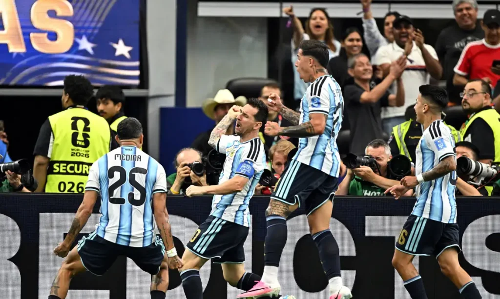 Soccer Football - FIFA World Cup 2026 - Group J - Argentina v Austria - Dallas Stadium, Arlington, Texas, U.S. - June 22, 2026
Argentina's Lionel Messi celebrates scoring their first goal with Enzo Fernandez, Facundo Medina and Thiago Almada IMAGN IMAGES via Reuters/Maria Lysaker     TPX IMAGES OF THE DAY