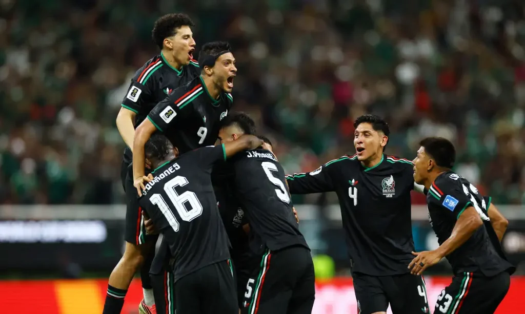 Soccer Football - FIFA World Cup 2026 - Group A - Mexico v South Korea - Estadio Guadalajara, Guadalajara, Mexico - June 18, 2026 Mexico's Luis Romo celebrates scoring their first goal with Jorge Sanchez, Raul Jimenez, Julian Quinones, Johan Vasquez, Edson Alvarez and Jesus Gallardo REUTERS/Daniel Becerril