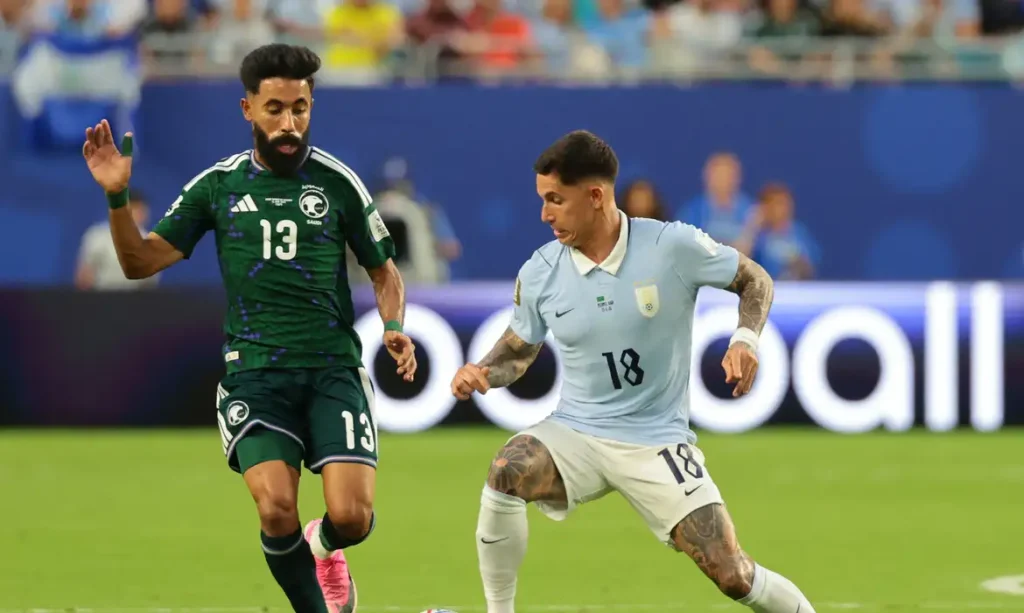 Soccer Football - FIFA World Cup 2026 - Group H - Saudi Arabia v Uruguay - Miami Stadium, Miami Gardens, Florida, U.S. - June 15, 2026 Uruguay's Brian Rodriguez in action with Saudi Arabia's Nawaf Bu Washl IMAGN IMAGES via Reuters/Sam Navarro