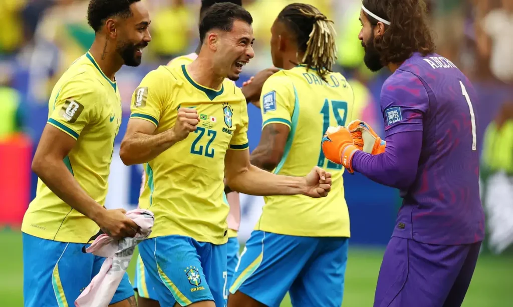 Soccer Football - FIFA World Cup 2026 - Round of 32 - Brazil v Japan - Houston Stadium, Houston, Texas, U.S. - June 29, 2026 Brazil's Matheus Cunha, Gabriel Martinelli and Alisson Becker celebrate after the match REUTERS/Phil Noble