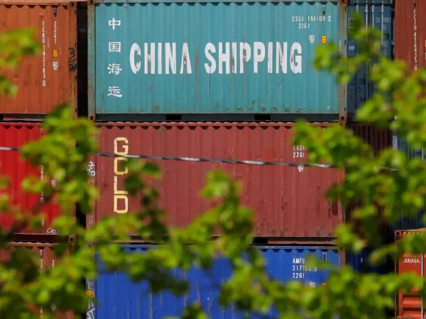FILE PHOTO: Shipping containers, including one labelled