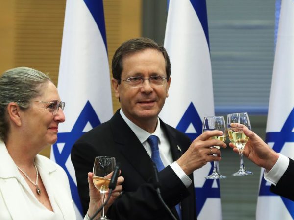 President-elect Isaac Herzog and his wife Michal celebrate after a special session of the Knesset whereby Israeli lawmakers elected the new president, at the Knesset, Israel's parliament, in Jerusalem