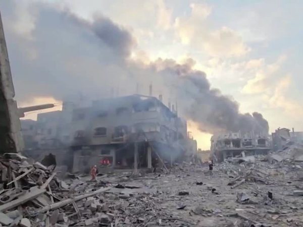 Smoke billows over flattened buildings in Gaza's Jabalia camp