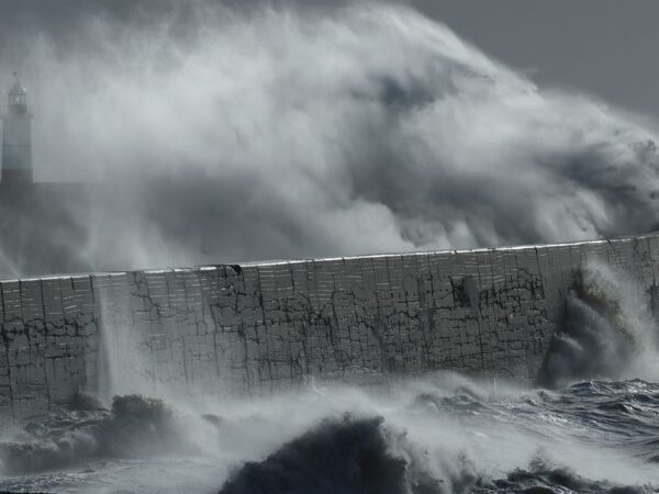 Large waves hit the harbour wall during Storm Isha in Newhaven, southern Britain, January 22, 2024. REUTERS/Toby Melville