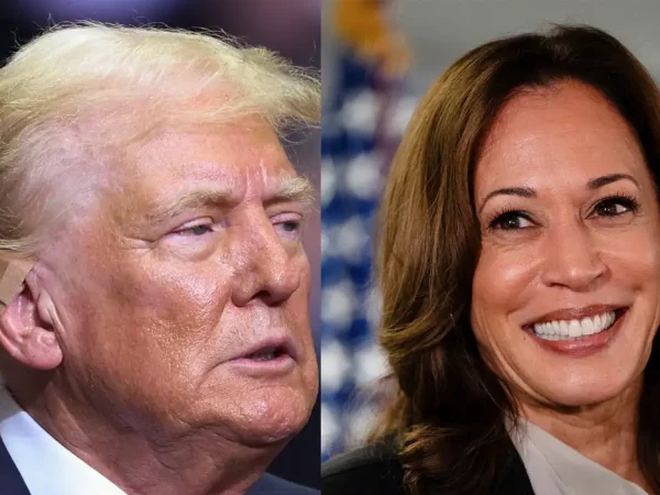 Republican presidential nominee and former U.S. President Donald Trump wears a flesh-colored bandage on his ear as he holds a campaign rally for the first time with his running mate, Republican vice presidential nominee U.S. Senator J.D. Vance (R-OH) in Grand Rapids, Michigan, U.S. July 20, 2024. REUTERS/Tom Brenner