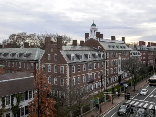 FILE PHOTO: A view of Harvard campus on John F. Kennedy Street at Harvard University is pictured in Cambridge, Massachusetts, U.S., December 7, 2023.  REUTERS/Faith Ninivaggi/File Photo/File Photo