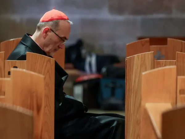 Cardinal Pierbattista Pizzaballa, the Latin Patriarch of Jerusalem, sits in the Church of All Nations on the day of a prayer service to mark Palm Sunday, following the cancellation of the traditional Palm Sunday procession from the Mount of Olives, amid restrictions on gathering in large groups and the U.S.-Israeli conflict with Iran, in Jerusalem, March 29, 2026. REUTERS/Ammar Awad/Pool     TPX IMAGES OF THE DAY