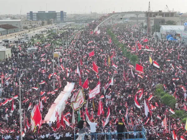 A drone view of supporters of Iraqi Shi'ite cleric Muqtada al-Sadr taking part in a peaceful protest against U.S. and Israeli actions in the region, amid the U.S.-Israeli conflict with Iran, in Basra, Iraq, April 4, 2026. REUTERS/Mohammed Aty