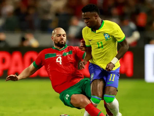 FILE PHOTO: Soccer Football - International Friendly - Morocco v Brazil - Grand Stade de Tanger, Tangier, Morocco - March 25, 2023 Morocco's Sofyan Amrabat fouls Brazil's Vinicius Junior REUTERS/Juan Medina/File Photo