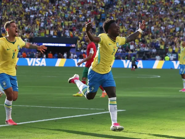 Soccer Football - FIFA World Cup 2026 - Group C - Brazil v Morocco - New York/New Jersey Stadium, East Rutherford, New Jersey, U.S. - June 13, 2026 Brazil's Vinicius Junior celebrates scoring their first goal with Bruno Guimaraes IMAGN IMAGES via Reuters/Vincent Carchietta