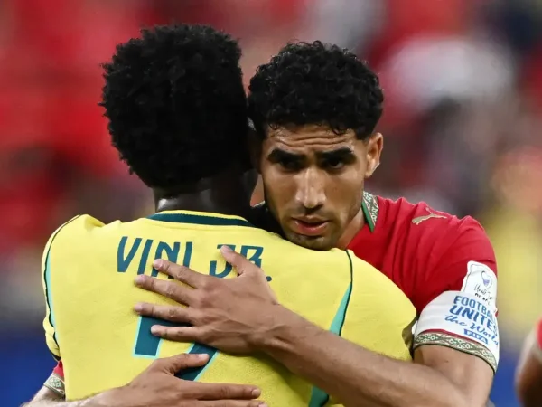 Soccer Football - FIFA World Cup 2026 - Group C - Brazil v Morocco - New York/New Jersey Stadium, East Rutherford, New Jersey, U.S. - June 13, 2026 Morocco's Achraf Hakimi embraces Brazil's Vinicius Junior after the match REUTERS/Dylan Martinez
