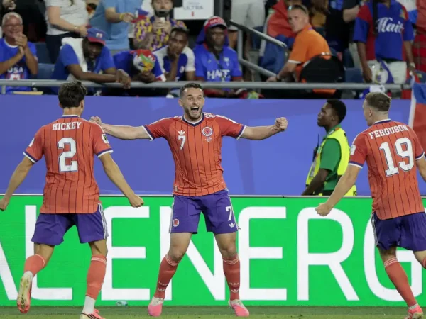 Soccer Football - FIFA World Cup 2026 - Group C - Haiti v Scotland - Boston Stadium, Foxborough, Massachusetts, U.S. - June 13, 2026 Scotland's John McGinn celebrates scoring their first goal with Aaron Hickey and Lewis Ferguson REUTERS/Brian Snyder