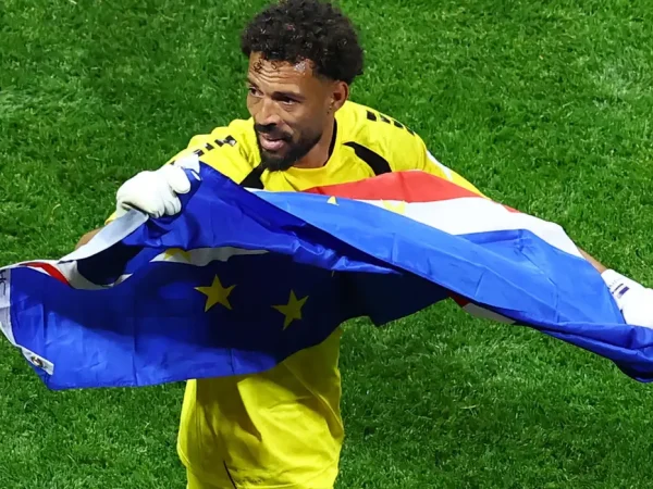 Soccer Football - FIFA World Cup 2026 - Group H - Spain v Cape Verde - Atlanta Stadium, Atlanta, Georgia, U.S. - June 15, 2026 Cape Verde's Vozinha celebrates with their national flag after the match REUTERS/Bernadett Szabo