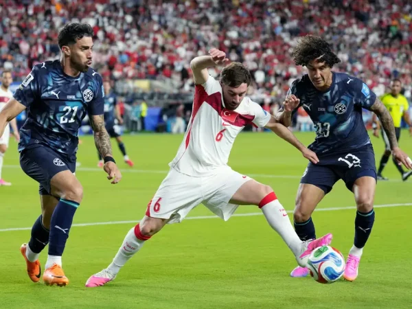 Soccer Football - FIFA World Cup 2026 - Group D - Turkey v Paraguay - San Francisco Bay Area Stadium, Santa Clara, California, U.S. - June 19, 2026
Turkey's Orkun Kokcu in action with Paraguay's Gabriel Avalos and Jose Canale IMAGN IMAGES via Reuters/Darren Yamashita