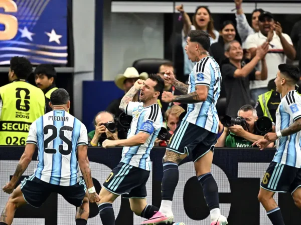 Soccer Football - FIFA World Cup 2026 - Group J - Argentina v Austria - Dallas Stadium, Arlington, Texas, U.S. - June 22, 2026
Argentina's Lionel Messi celebrates scoring their first goal with Enzo Fernandez, Facundo Medina and Thiago Almada IMAGN IMAGES via Reuters/Maria Lysaker     TPX IMAGES OF THE DAY