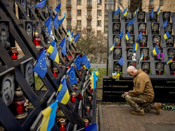 A soldier pays his respects at the monument to the so-called