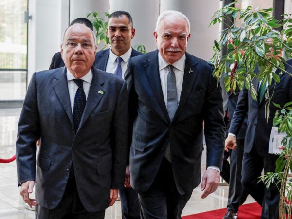 Palestinian Foreign Minister Riyad al-Maliki walks with Brazilian Foreign Minister Mauro Vieira, in Ramallah in the Israeli-occupied West Bank, March 17, 2024. REUTERS/Mohammed Torokman