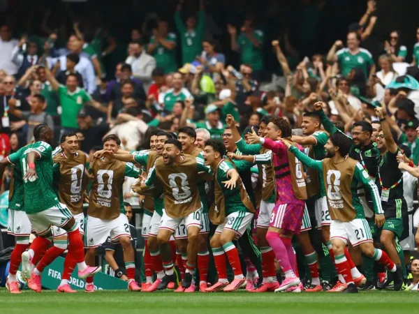 Soccer Football - FIFA World Cup 2026 - Group A - Mexico v South Africa - Estadio Azteca, Mexico City, Mexico - June 11, 2026 Mexico's Julian Quinones celebrates scoring their first goal with teammates REUTERS/Hannah Mckay     TPX IMAGES OF THE DAY