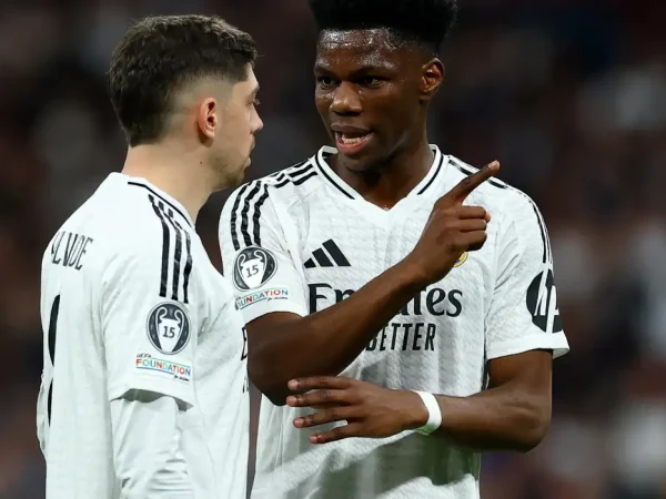 FILE PHOTO: Soccer Football - Champions League - Knockout Phase Playoff - Second Leg - Real Madrid v Manchester City - Santiago Bernabeu, Madrid, Spain - February 19, 2025 Real Madrid's Federico Valverde and Aurelien Tchouameni Action Images via Reuters/Matthew Childs/File Photo